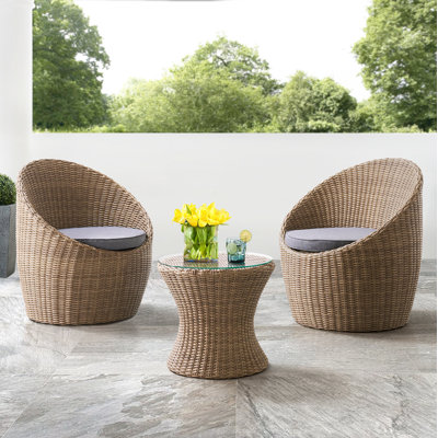 Jakeem 3-Piece Wicker Outdoor Seating Group with Cushions and Tempered Glass TopTable
