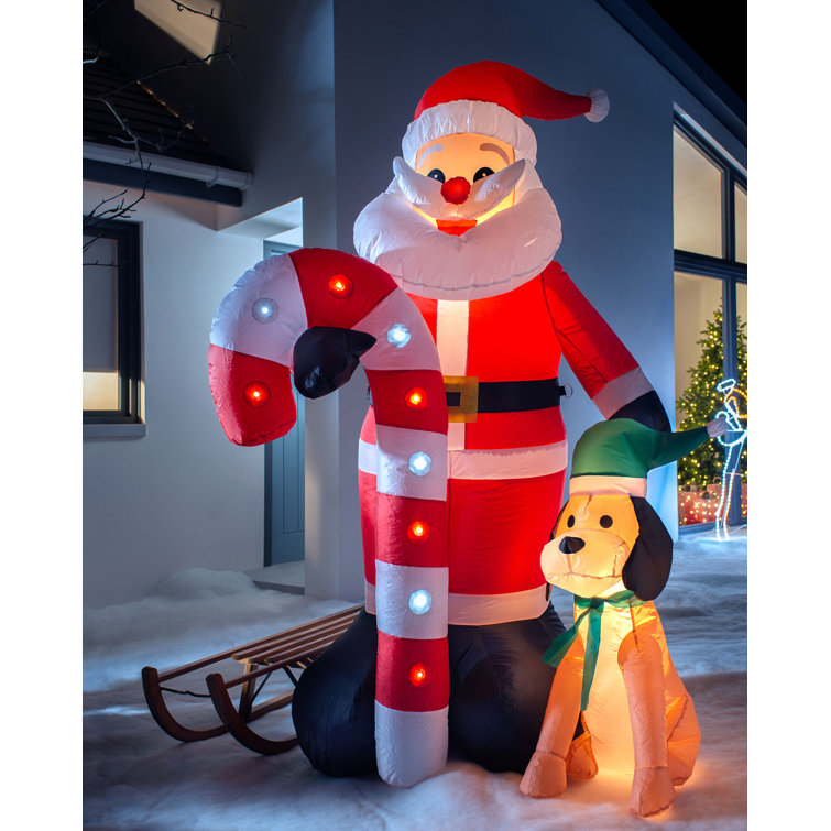 The Seasonal Aisle Pre-Lit Flashing Santa with Candy Cane u0026 Dog Inflatable  | Wayfair.co.uk