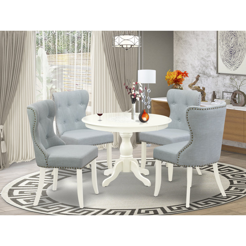 L'ensemble 5 pièces de table et chaises de cuisine comprend une table de salle à manger ronde avec piédestal et 4 chaises Parson en tissu bleu bébé, lin blanc