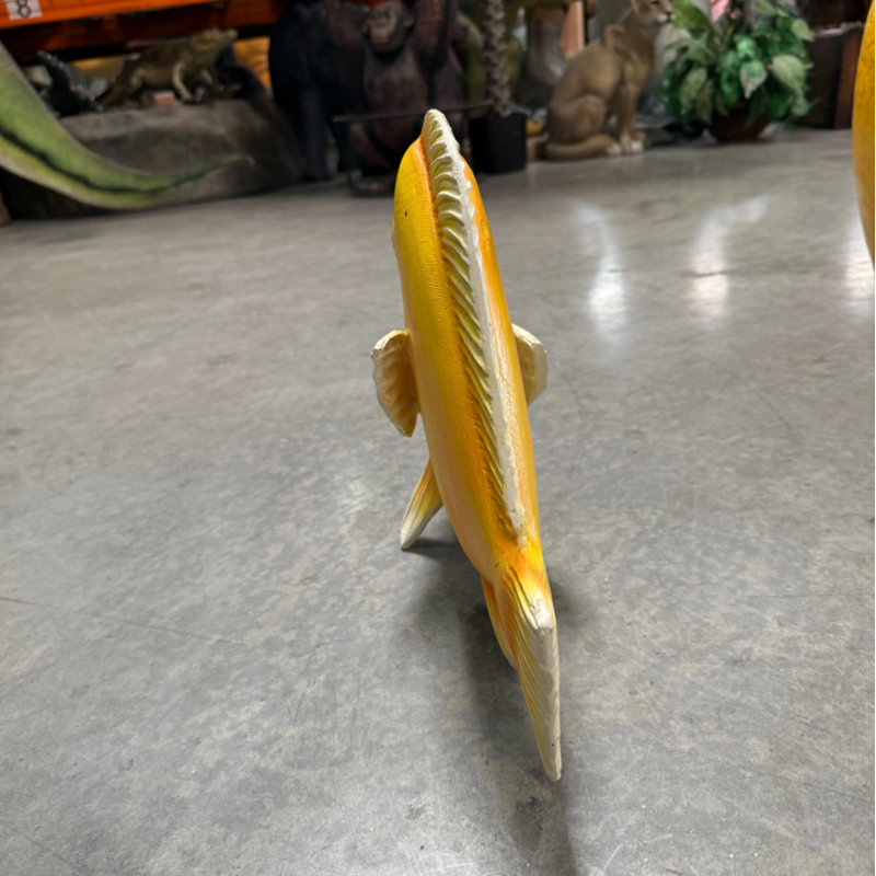 Statue poisson jaune