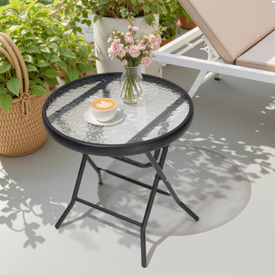 Table d'appoint d'extérieur pliée avec plateau rond en verre Hicham L 17,7 po x l 17,7 po