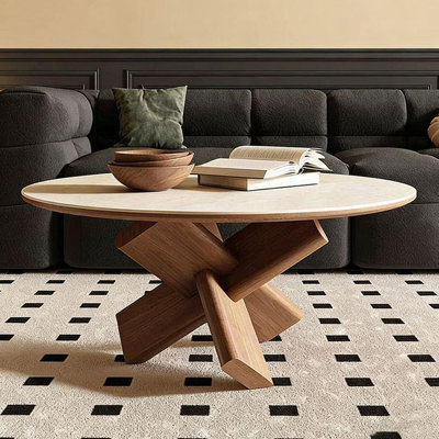 Image de couleur pierre et table basse ronde en bois massif