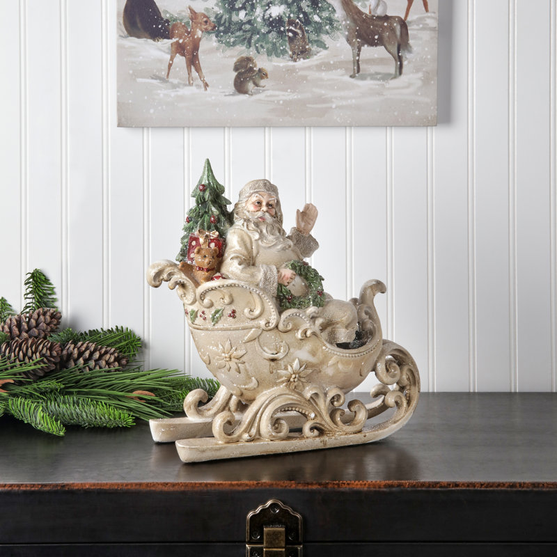 12" Resin Santa In Sleigh