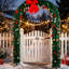 Arche de Noël avec guirlande lumineuse en PVC vert artificiel de 2,4 m (8 pi) et structure en acier, idéale pour décorer une porte, un jardin, un mariage ou une fête.