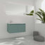 Meuble-lavabo flottant avec lavabo en résine en forme de goutte