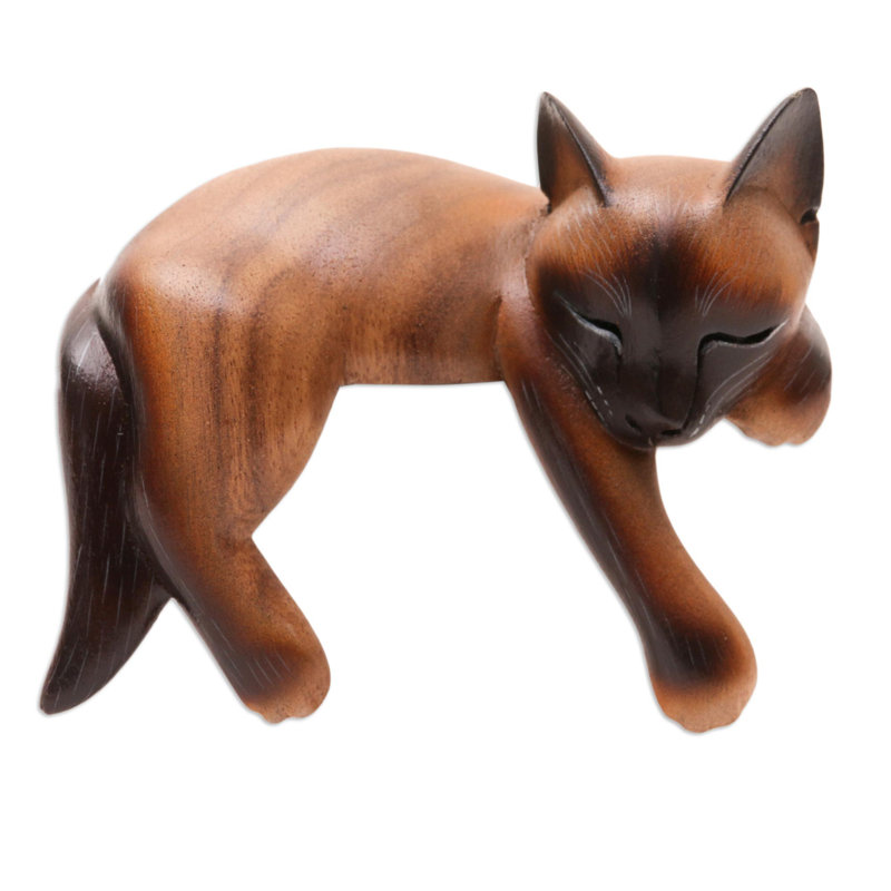 Statuette féline endormie