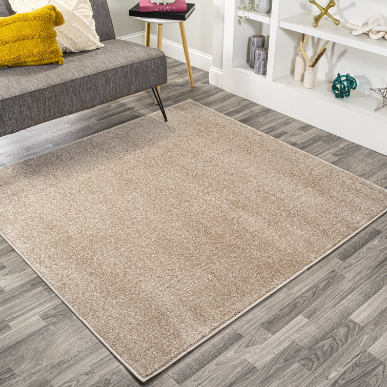 Asami Solid Low-Pile Beige Rug