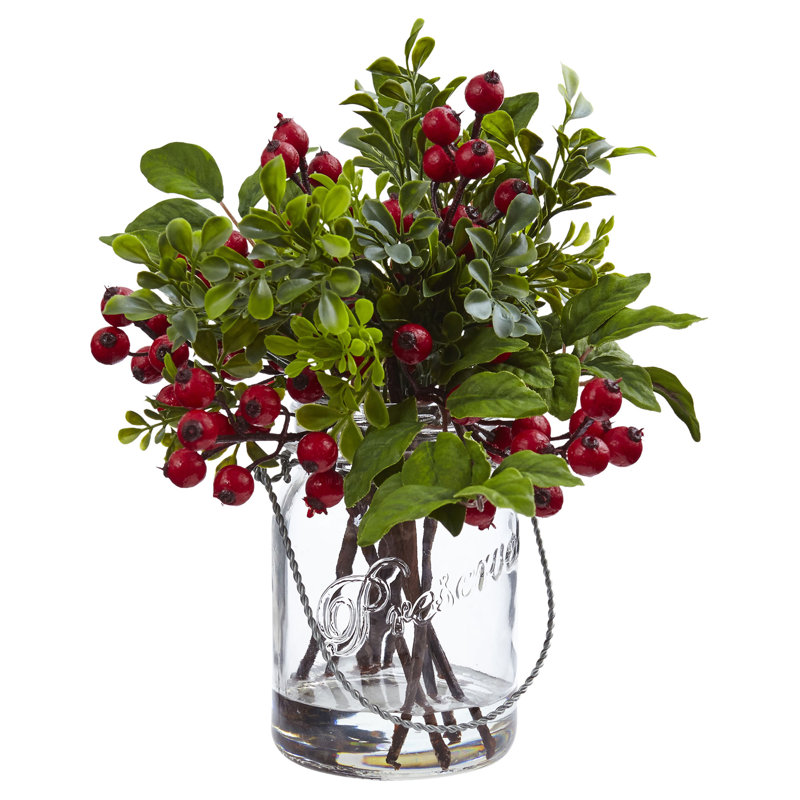 Arrangement floral mélangé dans un vase