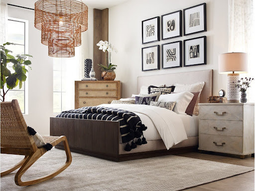 A gallery wall with graphic black-and-white prints.
