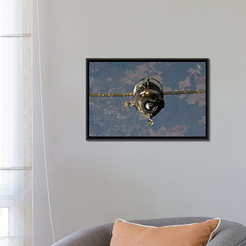 " The Soyuz TMA-19 Spacecraft " by Stocktrek Images, 18" H x 26" W x 1.5" D, Black Framed Canvas, No Mat