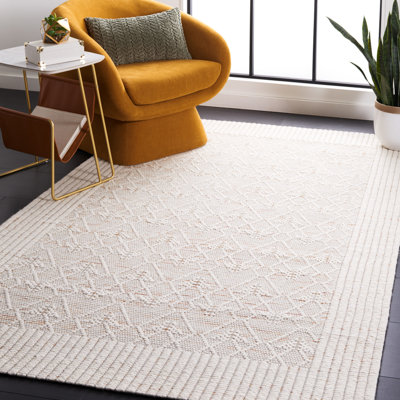 Manya Geometric Handwoven Wool/Polyester Area Rug in White/Beige