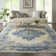 Burnie Oriental Blue/Ivory Area Rug