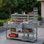 Îlot de cuisine pour patio avec plateau en acier inoxydable, tablette surélevée, tiroirs et tablettes ouvertes-126342028