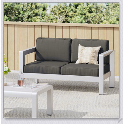 Causeuse d'extérieur en aluminium avec assise profonde et structure AVIara pour une détente élégante sur le patio