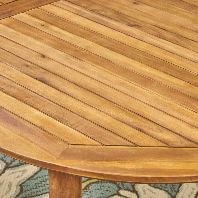 Table en bois - Pour des éléments extérieurs rigoureux, chic pour le patio ajoute une touche moderne