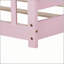 Lit simple au sol avec garde-corps de sécurité et porte tournante rose, parfait pour les enfants et les espaces compacts