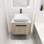 Meuble-lavabo de 24 po avec lavabo en céramique. Style mural en chêne blanc. Porte à fermeture en douceur. Rangement généreux. Poignée en métal. Ardoise moderne 24 po. Chêne. Bassin et abondance de sensation luxueuse