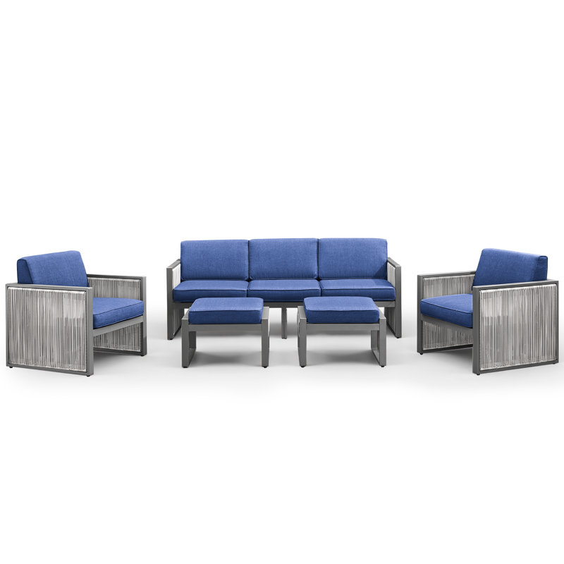 Ensemble de patio d'extérieur en osier 5 pièces Trinie avec repose-pieds et coussins, Bleu