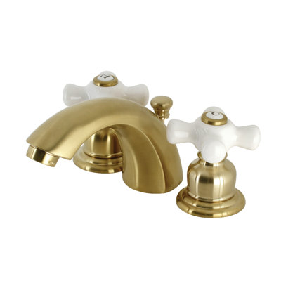 Kingston Brass Victorian Two-Handle 3-Hole Deck Mount Mini-Widespread Bathroom Faucet with Plastic Pop-Up