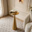 Table à boissons ronde en acier de 24 po de hauteur avec base fuselée, table d'appoint minimaliste moderne pour le salon et la chambre à coucher - Finition dorée