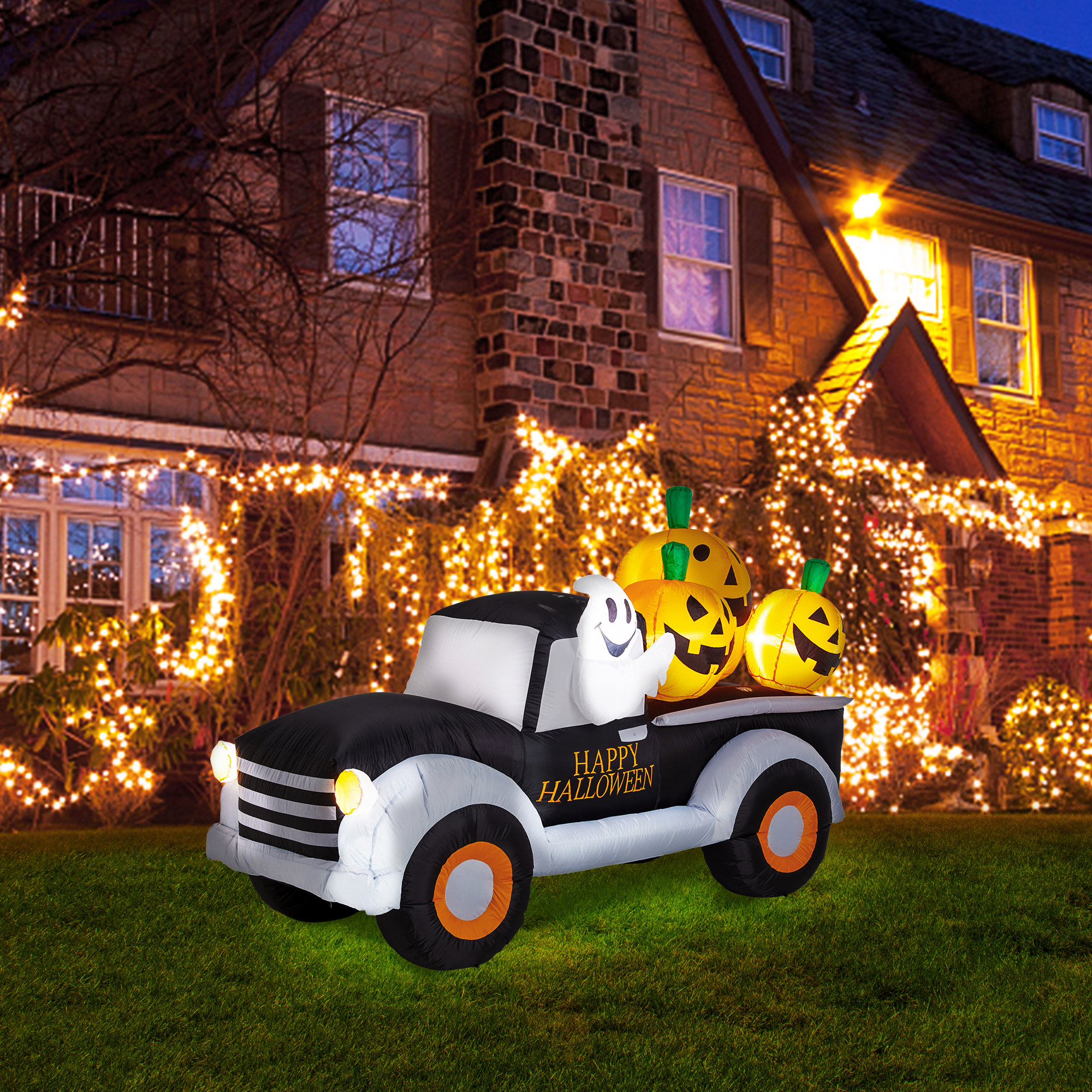 The Holiday Aisle® Truck with Jack-O-Lantern Pumpkins Lighted