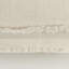 Coussin lombaire beige à motif botanique brodé
