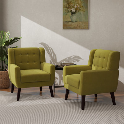 Fauteuil rembourré de velours vert avec dossier en bois massif Davey