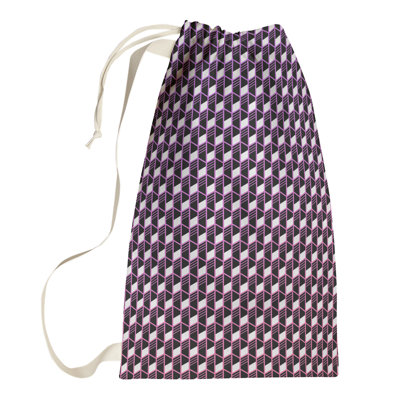 Sac à linge à rayures géométriques