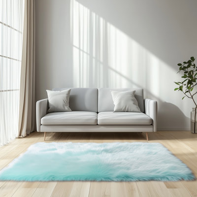 Tapis à poils longs en fausse peau de mouton bleu clair Kevn