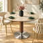 Table de salle à manger ronde moderne de 90 cm (35,4 po) avec plateau en pierre frittée imitation travertin, pied central en bois et base en acier inoxydable