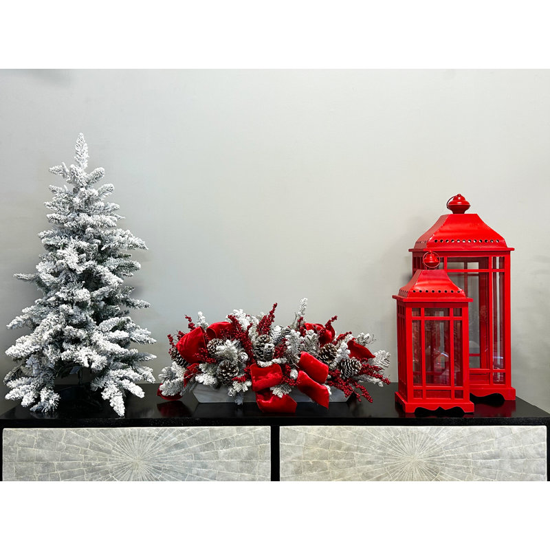 Snow Covered Evergreen And Pinecone Holiday Arrangement