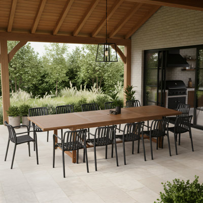 Ensemble de table de salle à manger extensible et chaises d'extérieur 13 pièces Wayland | Finition teck | Idéal pour le patio, la table brun clair et les chaises noires