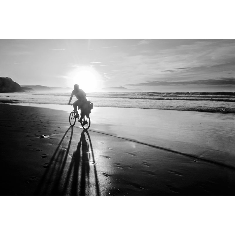 Biker on beach by Mimadeo - Wrapped Canvas Rectangle Print, 30cm H x 46cm W