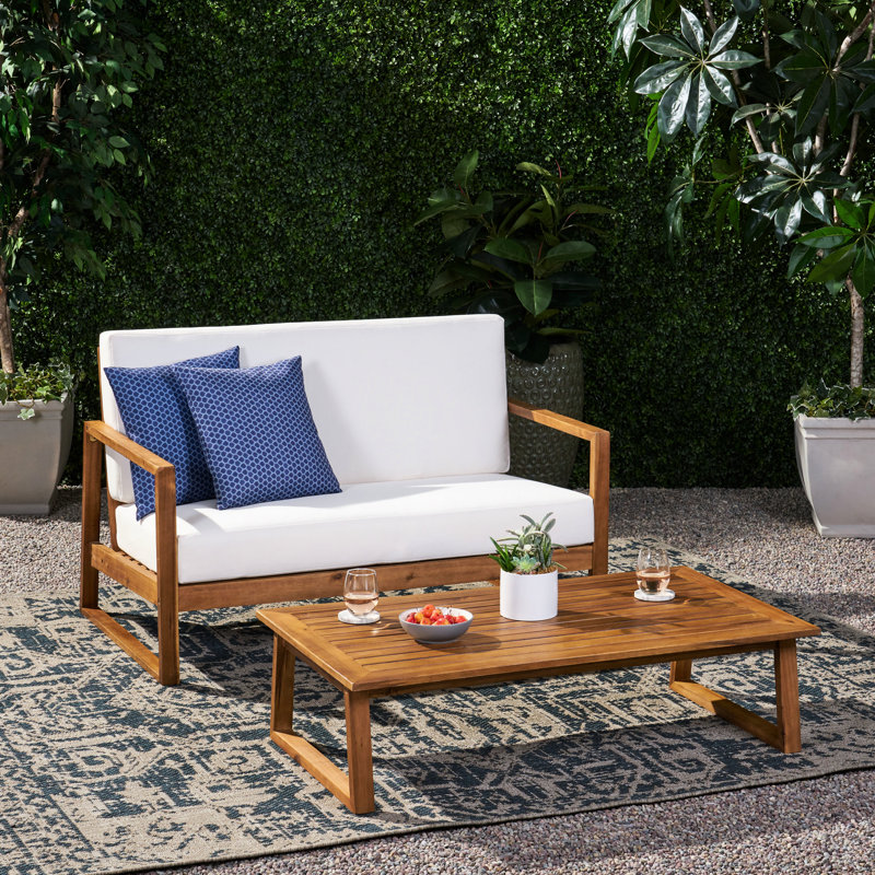 Table basse belge avec structure en lattes de bois, coussins d'eau pour terrasse, largeur 33,5 pouces, croquis en couleur.