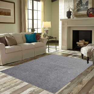 Tapis intérieur / extérieur gris uni rectangulaire en polyester tissé à la machine