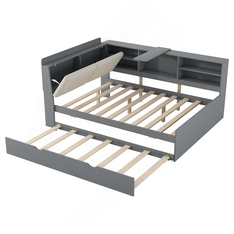 Lit plateforme en bois avec lit gigogne, tablettes et tête de lit en bois