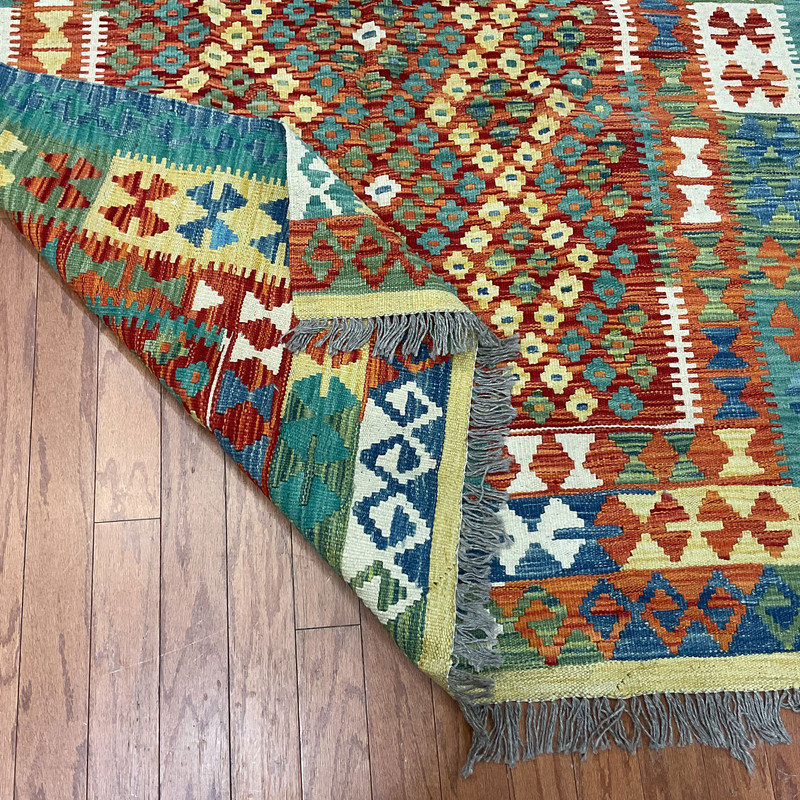 Tapis unique bleu, brun et rouge de 4 pi 11 po x 6 pi 9 po