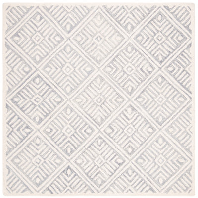 Vedika Hand Tufted Wool Southwestern Rug