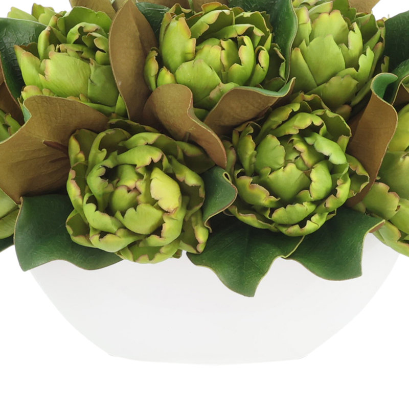 Magnolia and Artichoke Floral Arrangements in a Fiberstone Pot
