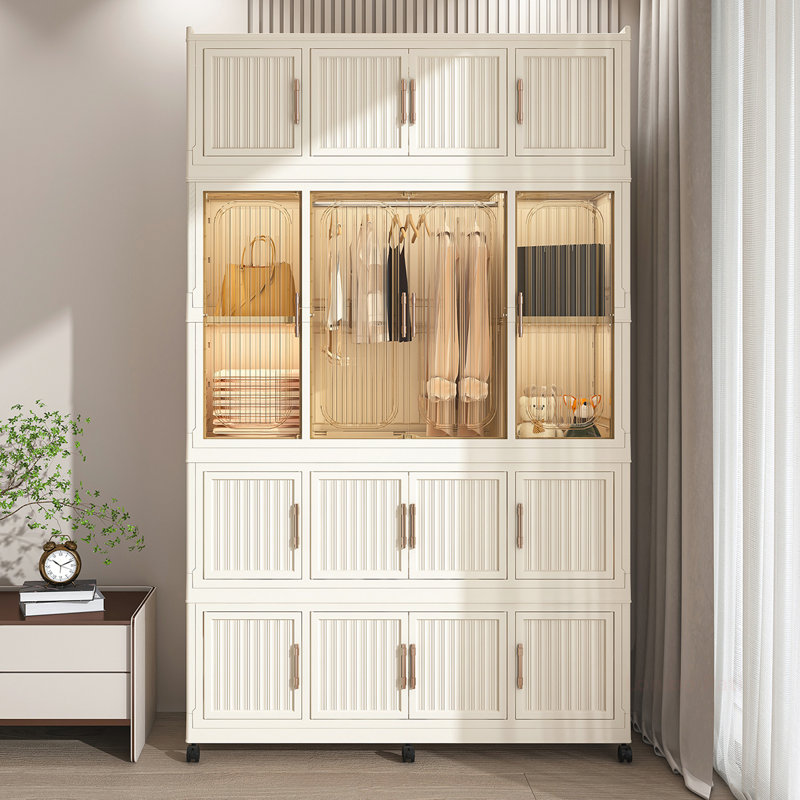 Armoire portable avec plusieurs compartiments et tringle pour un rangement efficace