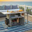 Chariot de cuisine pliable pour l'extérieur avec deux plateaux de table et rangement pour barbecue et patio-125396960