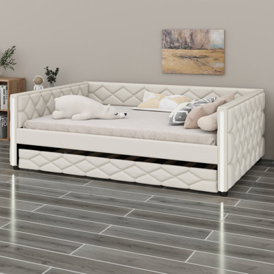 Space-Saving Upholstered Daybed with Trundle, Ideal for Small Spaces