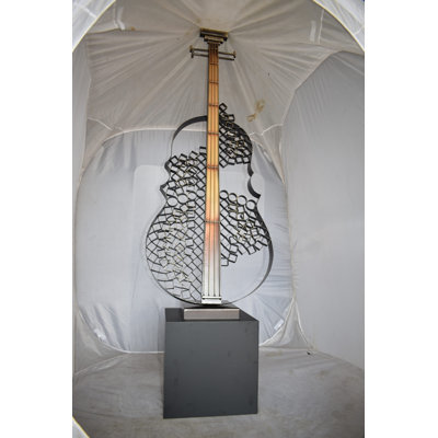 Voyd Guitar Sculpture Creative And Modern Metal Guitar on Base Art Piece Size: 21" x 18" x 71"H