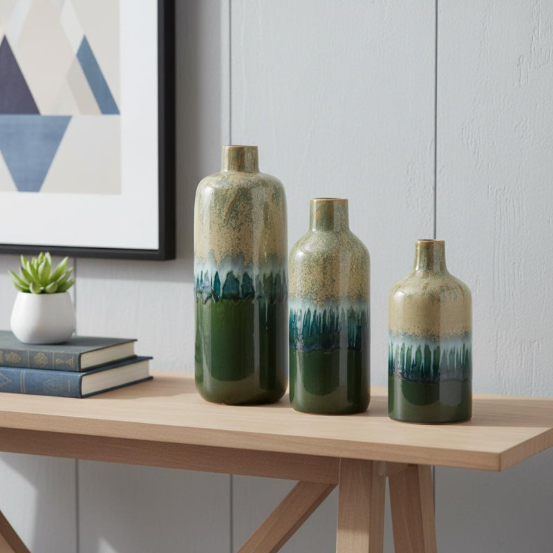 Ensemble de trois vases de table ronds en céramique beige et bleu