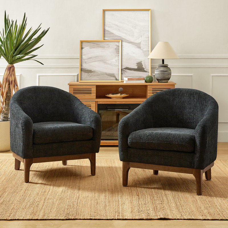 Fauteuil demi-tonneau rembourré avec pieds en bois massif Berklie, Laine noire