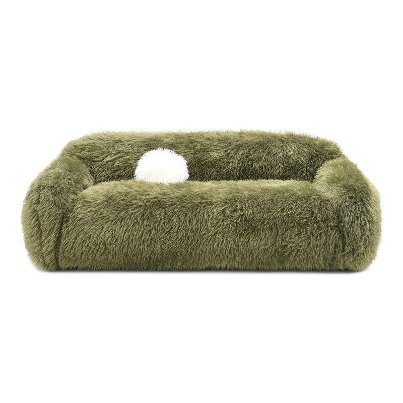 Canapé Harry en fausse fourrure avec coussin boule, Vert