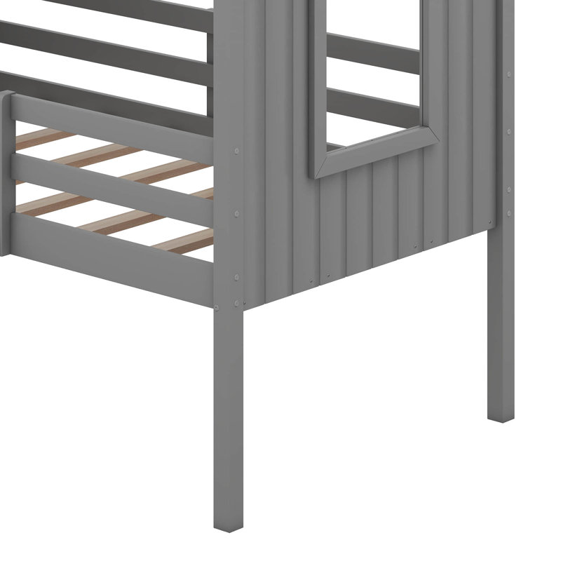 Lit mezzanine simple en bois avec deux fenêtres latérales