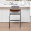 Tabouret de comptoir rembourré avec accoudoirs Devane-123161721