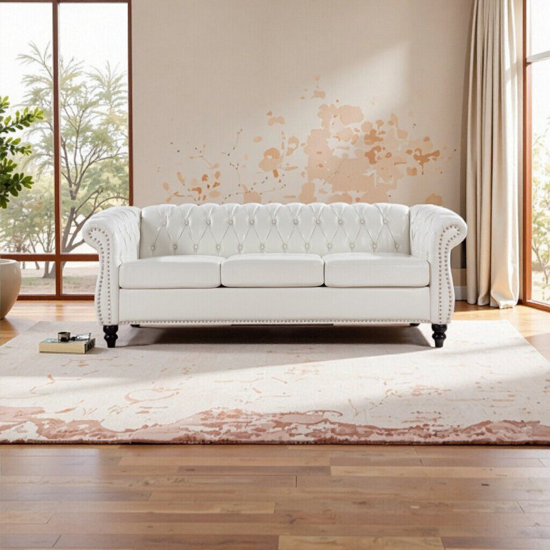 Élégant canapé Chesterfield à accoudoirs roulés de 84,65 po en cuir de polyuréthane blanc intemporel pour des espaces de vie confortables