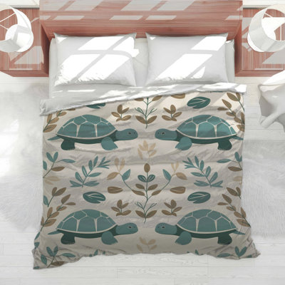 Édredon tortues avec feuilles